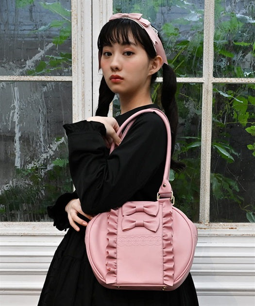 Twin Ribbon Round Bag