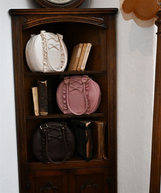 Twin Ribbon Round Bag