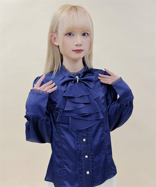 Blouse with jabot brooch