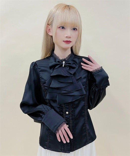 Blouse with jabot brooch